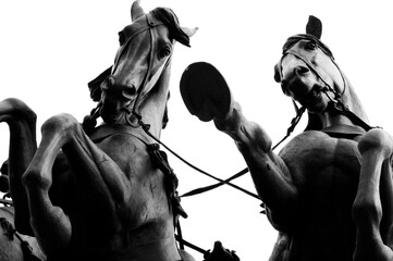 detail of a bronze statue of galloping horses, London, UK