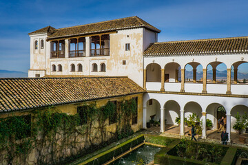 Fototapeta premium Inside the Generalife palace (part of the Alhambra complex in Granada, Spain), gardens and fountains welcome the visitor. 