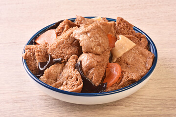 Braised wheat gluten. Mushroom and carrot with brown sauce 