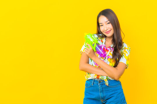 Portrait beautiful young asian woman wear colorful shirt for sonkran festival