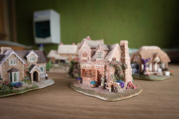 Collection of miniature ornament houses close together with depth of field