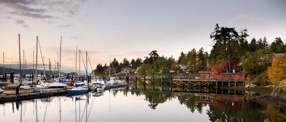 panoramic view of harbour and marina at Brentwood Bay, BC at sunset
