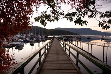view on pier of harbour and marina at Brentwood Bay, BC at sunset