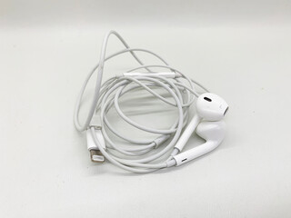White earphones isolated on white background