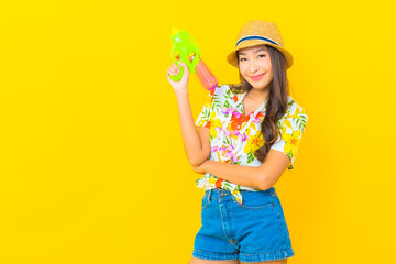 Portrait beautiful young asian woman wear colorful shirt for sonkran festival