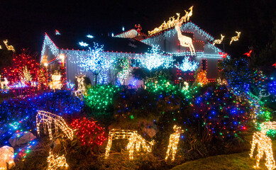 enthusiastic Christmas lights on a suburban house