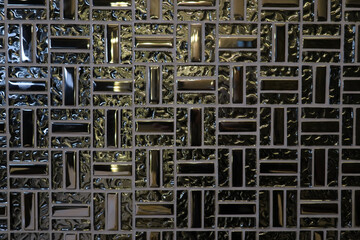 テクスチャー　高級感のあるメタリックなタイルの壁　texture of metallic pattern wall