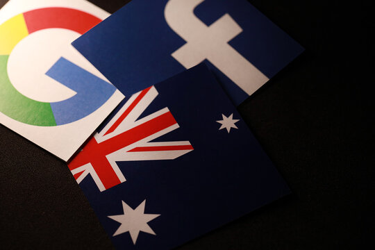 The Australian Government Wants Facebook And Google To Pay For News On Their Sites. Close Up Image Of Australia Flag, Google And Facebook Logo. PENANG, MALAYSIA - 20 FEB 2021.