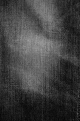 Denim jeans background. Black cotton fabric.