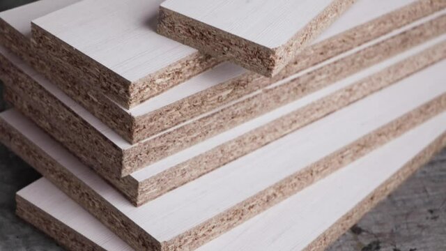 Stack of laser cut white melamine boards