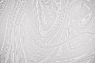Fototapeta na wymiar close-up mix of watercolor, acrylic, oil and oil to use as a background image. White oil paint for use as a background