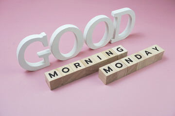 Good Morning Monday Word alphabet letters on pink background