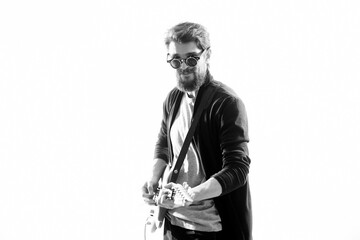 Man wearing sunglasses from guitar music performance lifestyle