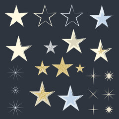 Obraz premium a set of stars of various shapes in gold, silver and gray colors on a dark background
