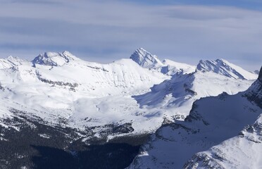 Snowcapped Mountain Peaks Aerial Landscape View.  Winter Rock Climbing in Banff National Park, Canadian Rockies