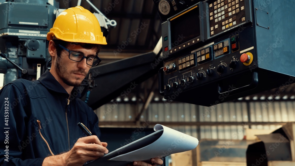 Poster skillful factory worker working with clipboard to do job procedure checklist . factory production li
