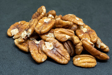 Some walnuts in a pile