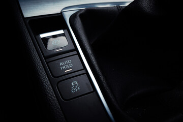 Electric parkbrake button and autohold in the passenger car