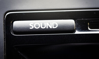 Button from a car audio stereo system from a German car