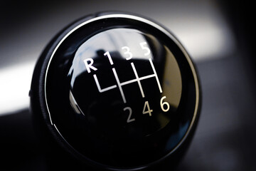 Shiny black 6-speed gearbox in a new car