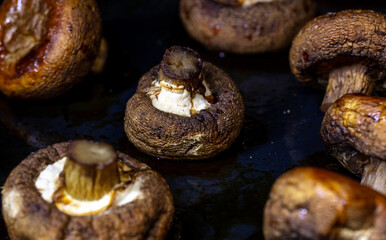 Baked mushrooms champignons in the oven.