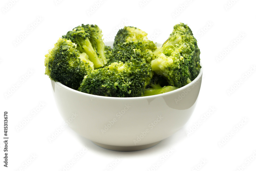 Wall mural Broccoli in bowl isolated on white background