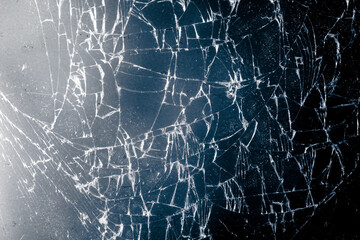 Broken blue glass as background.