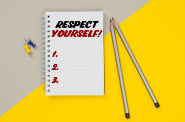 On a yellow-gray background are pencils, buttons and a notebook in which it is written - Respect Yourself