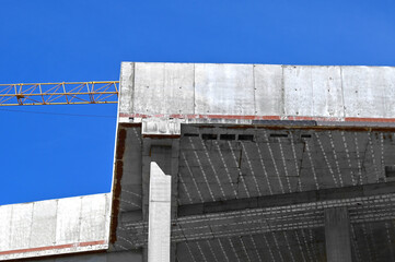 Crane and highrise construction site