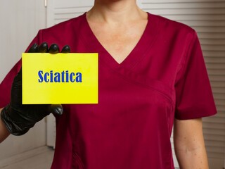 Healthcare concept about Sciatica with inscription on the sheet.