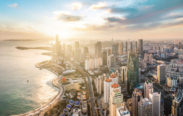 Aerial photography of Qingdao coastline buildings and clouds at dusk