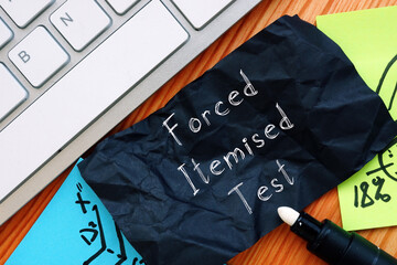  Financial concept meaning Forced Itemised Test with sign on the sheet.
