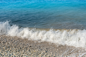 Sea waves on the pebble beach