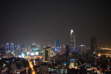 Fototapeta na wymiar Aerial view of Skyscraper and city view of Ho Chi Minh in Vietnam - ベトナム ホーチミン 夜景