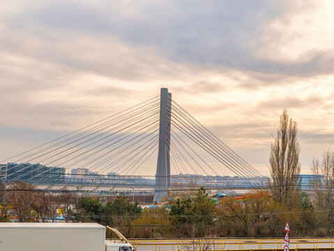 The newly built Ciurel Bridge at sunset, in Bucharest Romania. Steel wires bridge structure.