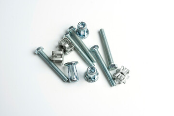 a few nuts and bolts of metal close-up
