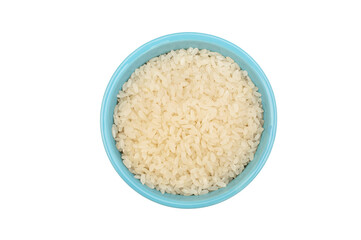 Small blue ceramic bowl with rice. Isolated on white. Top view.