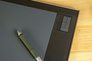 Professional graphics tablet on the table.