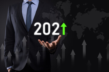 Plan business positive growth in year 2021 concept. Businessman plan and increase of positive indicators in his business, Growing up business concepts.