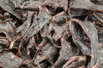 Helpful treats for pets. Close-up Pieces of stewed beef heart.