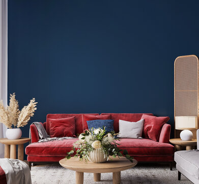 Living room interior mock-up with red sofa, wooden table and rattan home decoration in dark blue background, 3d render