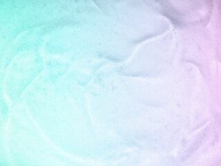 Gel serum face cleanser lotion textured pastel turquoise and purple faded beauty background