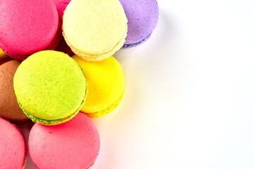 Sweet Macaron of different colors on an white background