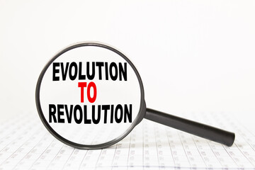 words EVOLUTION TO REVOLUTION in a magnifying glass on a white background. business concept