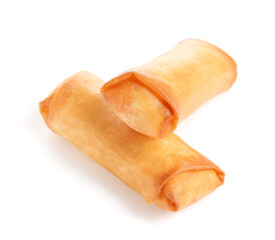 Tasty fried spring rolls on white background