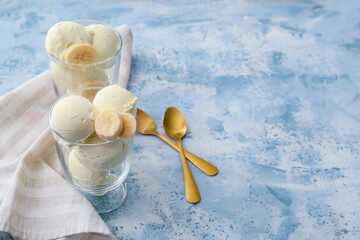 Tasty banana ice-cream on color background