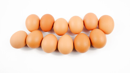 Several eggs are placed on a white background.
