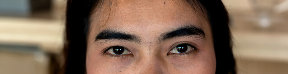 Fototapeta premium Close up Eyebrows and eyes young Asian Female.