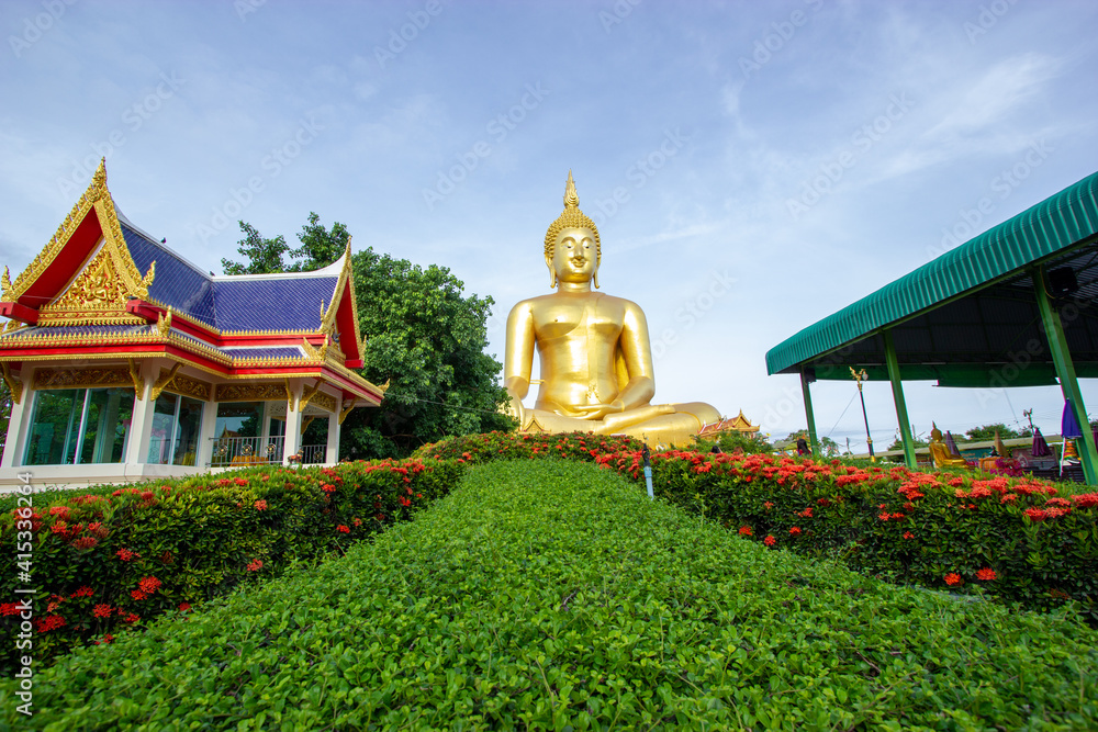 Wall mural temple city , golden buddha statue