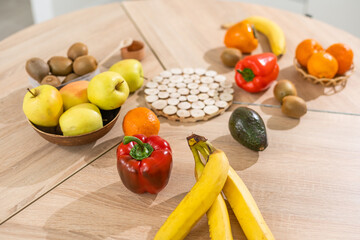 Closeup on table with vegetables in kitchen